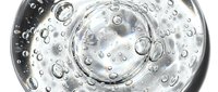 Transparent water droplets and bubbles floating in clear liquid, isolated on white background for design and advertising use.