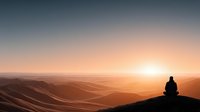 Person meditating on mountain peak during golden hour sunrise with layered hills and warm orange sky creating peaceful atmosphere for wellness content.