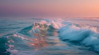 Ocean waves crashing with pink sunset light reflecting on water surface creating dramatic seascape with foam and spray for nature backgrounds.