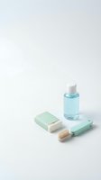 Mint green bathroom accessories set with soap, liquid bottle, toothbrush and razor on clean white background for personal care and hygiene concepts.