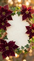 Festive holiday frame with red poinsettia flowers, green ivy leaves and cinnamon sticks on warm bokeh background for Christmas greeting cards and decorations.