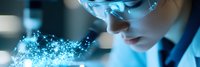 Young Asian female scientist in protective eyewear examining glowing blue particles in dark laboratory setting, demonstrating advanced research and innovation in science.