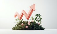 Pink upward trending arrow emerging from decorative moss and tiny flowers arrangement on white background, representing sustainable business growth and success.