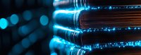 Glowing blue light illuminates stack of vintage books creating magical atmosphere against dark background with bokeh effect, panoramic composition.