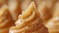 Golden crispy churro with sugar coating in spiral shape, traditional Spanish pastry dessert for bakery menu and food photography.