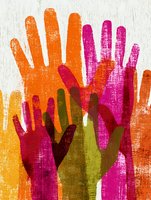 Colorful handprints in vibrant orange, pink and green hues creating artistic pattern on textured white background for community and teamwork concepts.
