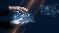 Hands holding glowing digital network hologram with connected nodes and data streams, representing technology innovation, cloud computing, and digital transformation in business environment.