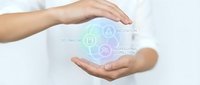 Hands protecting holographic wellness icons showing meditation, journaling and professional development concepts for mental health and personal growth.