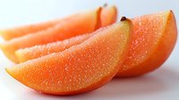 Fresh juicy orange wedges with water droplets on bright surface, macro close-up view showing citrus fruit texture and natural moisture.
