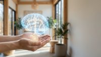 Human hands holding glowing digital brain hologram with neural network connections in modern office interior for artificial intelligence and technology concepts.