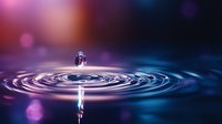 Water droplet creating ripples on liquid surface with vibrant purple and blue gradient lighting effects for modern design projects.