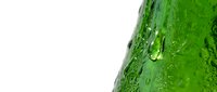 Fresh green bottle with water droplets on white background, isolated for beverage packaging and advertising design use.