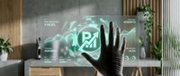 Hand in black glove touching holographic rupee currency symbol with financial data charts and graphs in modern office workspace with plants and natural light.
