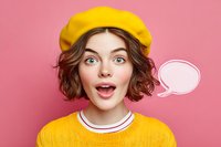 Young woman with surprised expression wearing yellow beret and sweater against pink background with speech bubble, perfect for communication concepts.