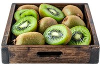 Fresh ripe kiwi fruits cut in half showing green flesh and black seeds arranged in rustic wooden box, isolated on white background for food photography.