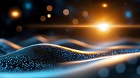 Futuristic digital landscape with glowing particles forming wavy surface against dark background with light flares and bokeh effects creates technological atmosphere.