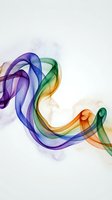 Abstract colorful smoke waves flowing in purple blue green orange hues on light background for modern design projects.