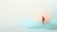 Solitary figure walking through misty winter landscape with soft pastel tones of blue, pink and cream, evoking solitude and contemplation in cold weather conditions.