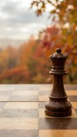 Wooden chess queen piece on board with blurred autumn foliage background, strategic thinking and leadership concept for business presentations.
