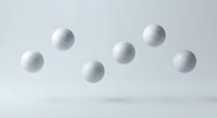 Six white golf balls floating in mid-air against clean white background, sports equipment isolated for design projects and promotional materials.