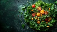 Fresh kale leaves with colorful cherry tomatoes and almonds on dark green background with water drops, dramatic food photography for healthy eating concept.