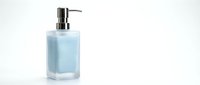 Blue liquid soap dispenser bottle with chrome pump isolated on white background for bathroom and kitchen hygiene products mockup design.