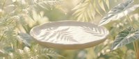 Empty wooden bowl with palm leaf shadows in tropical sunlight creating natural organic display for product photography and food presentation.