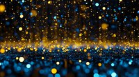 Magical glowing bokeh lights in gold and blue colors create dreamy festive atmosphere against dark background, abstract defocused sparkles and particles.