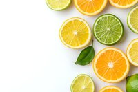 Fresh citrus slices of orange, lemon and lime with green leaf arranged on white background, top view with copy space for healthy food design.