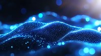Glowing blue particle wave with bokeh light effects on dark background, digital technology concept for presentations and modern designs.