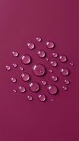 Transparent gel droplets of varying sizes arranged on a magenta background, showcasing liquid skincare, cosmetics, or serum products for beauty and wellness marketing.