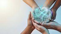 Hands protecting glowing brain hologram symbolizing mental health care, neurology research, and cognitive wellness support in medical technology.