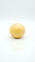 Fresh yellow potato isolated on white background, suitable for food photography, culinary content, and grocery or agriculture marketing materials.