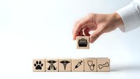 Hand placing wooden block with microchip icon above veterinary care symbols on white background. Technology integration in animal healthcare concept.