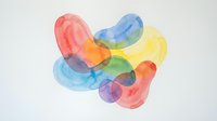 Colorful watercolor abstract shapes overlapping in vibrant rainbow hues creating artistic composition on white background for creative design projects.