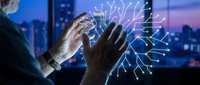 Businessman touching digital network connections with glowing light effects against city skyline at night for technology and innovation concepts.