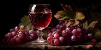 Glass of red wine with fresh purple grapes and autumn vine leaves on rustic wooden surface against dark background for culinary and beverage themes.