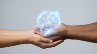 Hands holding glowing digital brain hologram representing artificial intelligence, technology innovation, and futuristic neural network concepts.