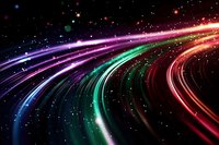 Vibrant curved light trails in rainbow colors streak across dark space background with glowing stars and particles, creating dynamic motion effect for technology designs.