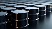 Industrial black oil barrels arranged in rows for petroleum storage and transportation in warehouse facility.