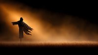 Silhouette of person with outstretched arms standing in golden field at sunset with dramatic lighting and flowing clothing creating spiritual atmosphere.