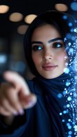 Young woman with Middle Eastern ethnicity wearing dark hijab, pointing finger at camera with glowing blue digital particles and bokeh lights in background, representing technology, innovation, and digital transformation.