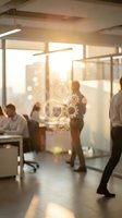 Modern office environment with glowing gear mechanism overlay representing teamwork and business processes in corporate workspace with natural sunlight.