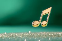 Golden musical note symbol floating above glittering surface against emerald green background. Luxury entertainment and music concept with bokeh effect.