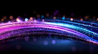 Glowing curved lines with sparkling particles in pink, purple and blue colors against dark background create magical light trail effect for festive designs.