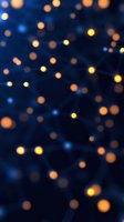 Glowing orange and yellow light dots connected by subtle blue lines on dark background create abstract network pattern for technology and connection concepts.