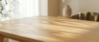 Empty wooden table surface in modern kitchen interior with blurred background for product display and food photography mockup.