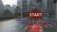 Glowing red start text with digital network connections and hexagonal pattern overlay against blurred urban background, futuristic technology concept.