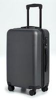 Modern black hard shell carry-on suitcase with four wheels and telescopic handle isolated on white background for travel and vacation designs.