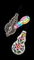 Decorative ornament set featuring ornate silver filigree pendant, rainbow gradient spoon, and hand-painted ceramic bulb with floral motifs. Isolated on transparent background, ready for clipart, print-on-demand, sublimation, and design projects.